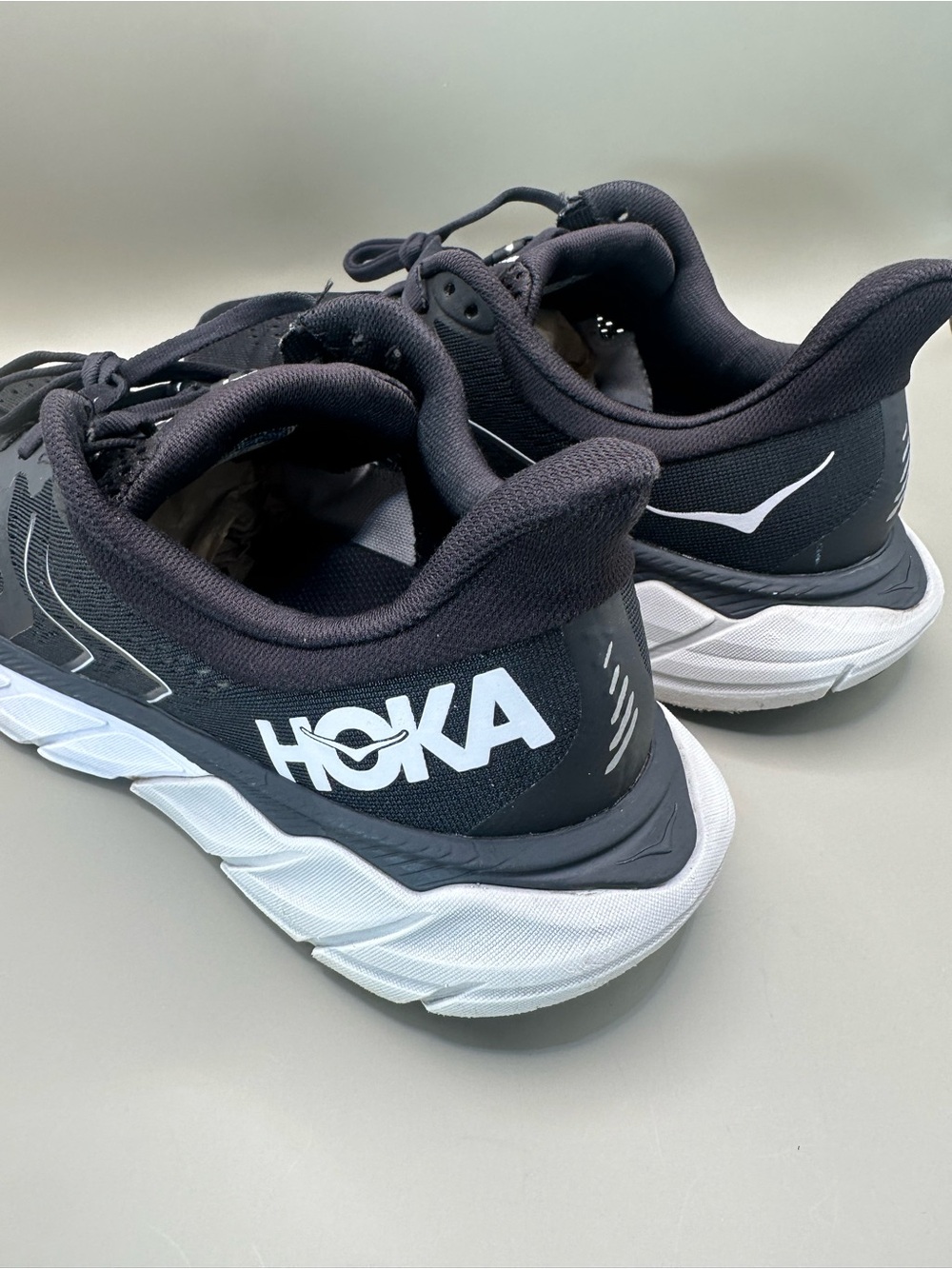 Hoka Black and White Athletic Sneakers